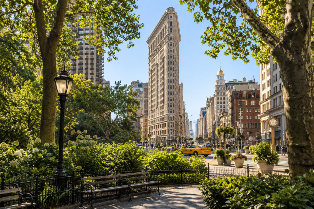 Destinations Flatiron Building seen from Madison Square Park in New York City